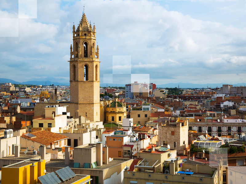 General view on city and cathedral in Reus in evening